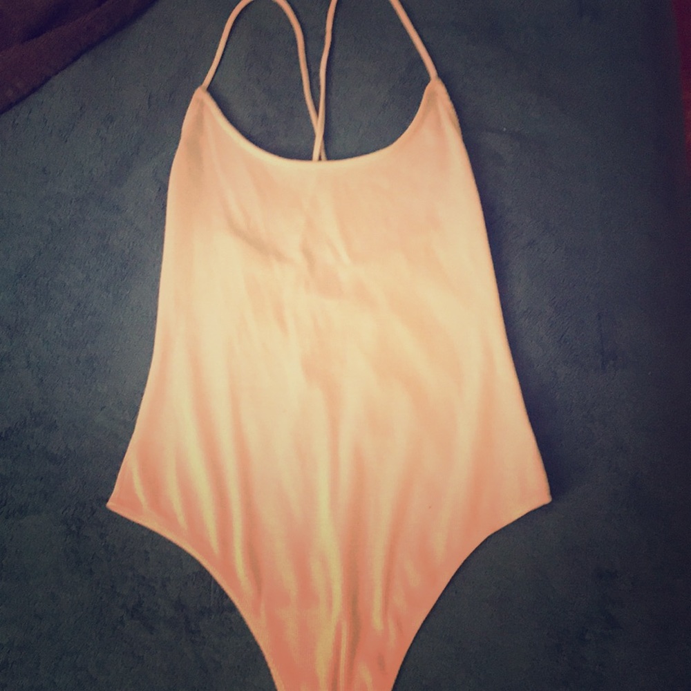 White ribbed bodysuit with lace up back!